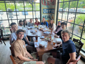 Photo of team members having lunch.